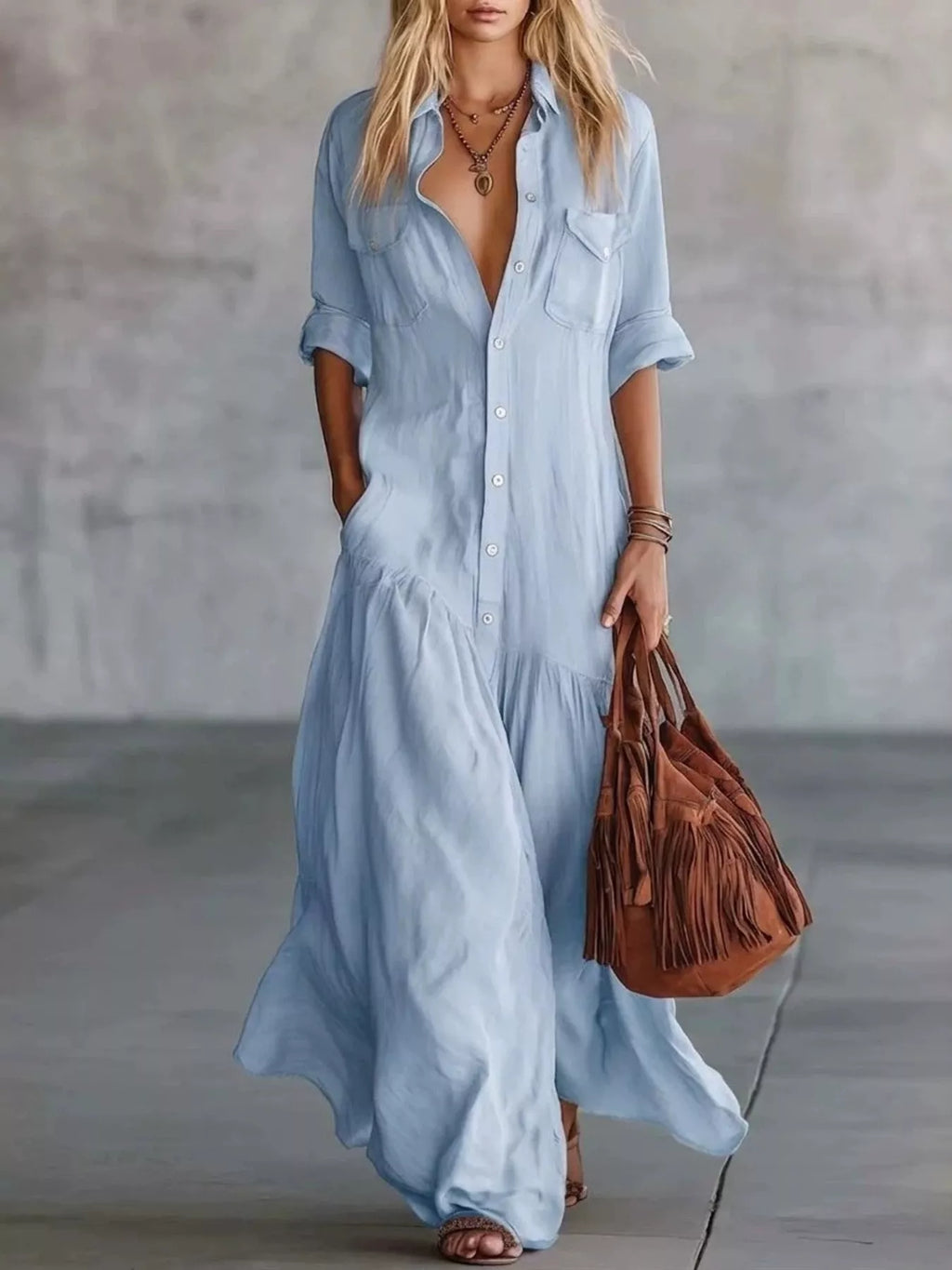 Light blue button-front maxi shirt dress with rolled sleeves and pockets shown in a front styled view